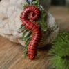 Naszyjnik z krocionogiem Trigoniulus corallinus Naszyjnik z krocionogiem Trigoniulus corallinus (Unique Fantasy Objects)