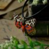 Naszyjnik z rzeźbą motyla niedźwiedziówka kaja (Unique Fantasy Objects)