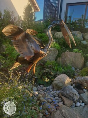 Metalowa rzeźba żurawia (This Guy in a Hat)