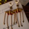 Kolczyki z rzeźbą motyla niedźwiedziówka purpurka (Unique Fantasy Objects)