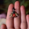 Mały naszyjnik z motylem niedźwiedziówka hebe (Unique Fantasy Objects)