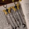 Kolczyki z rzeźbą motyla latolistek cytrynek i łańcuszkami (Unique Fantasy Objects)