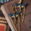 Kolczyki z rzeźbą motyla zmierzchnica trupia główka i łańcuszkami (Unique Fantasy Objects)