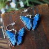 Kolczyki z rzeźbą motyla Morpho menelaus Kolczyki z rzeźbą motyla Morpho menelaus (Unique Fantasy Objects)